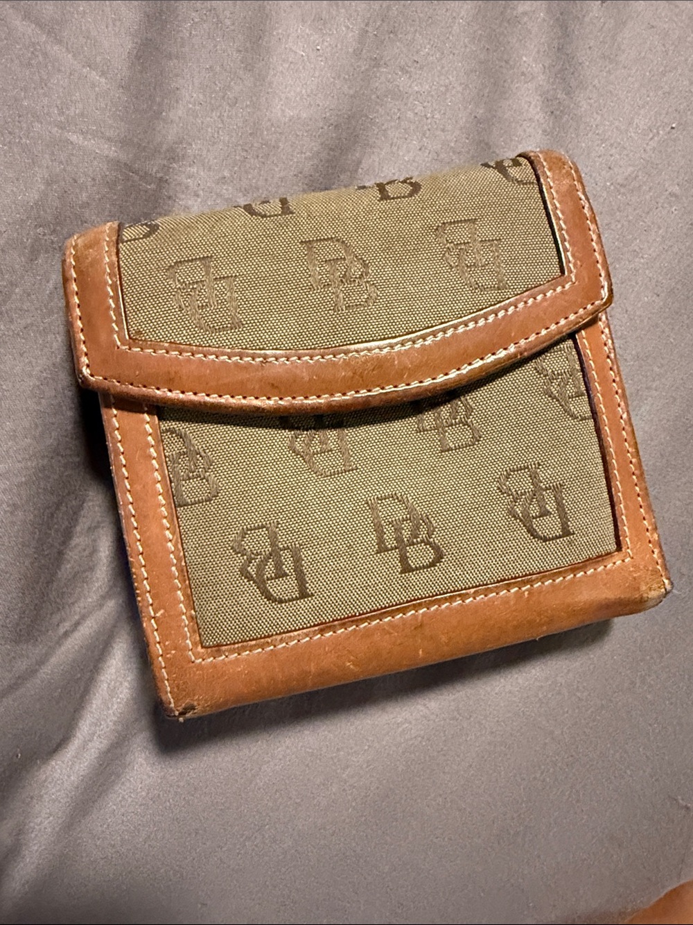 Dooney & Bourke monogrammed Canvas and Brown Leather Fold Wallet